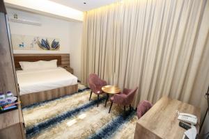 Letto o letti in una camera di فندق المدينة القديمة Old Town Hotel
