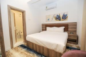 Letto o letti in una camera di فندق المدينة القديمة Old Town Hotel