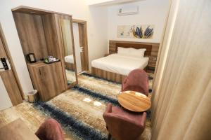 Letto o letti in una camera di فندق المدينة القديمة Old Town Hotel