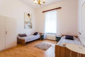 Posteľ alebo postele v izbe v ubytovaní Park Guest House By Blueapartments