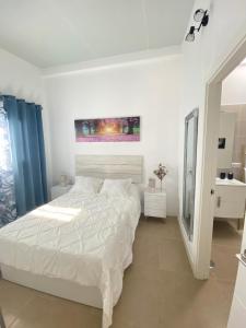 A bed or beds in a room at Villa Residencial El Guaidil