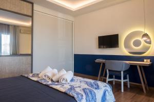 Posteľ alebo postele v izbe v ubytovaní Asteris Village