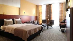 TV/trung tâm giải trí tại Hotel en privé-wellness De Nieuwe Doelen