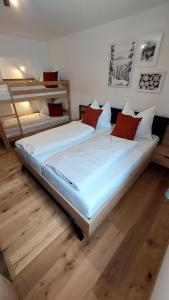 Postel nebo postele na pokoji v ubytování Ferienwohnung Ida inkl SommerCard