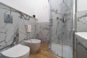 A bathroom at Ortigia Superior Sea View Apartment near Duomo