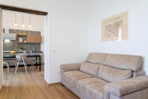 A kitchen or kitchenette at Ortigia Superior Sea View Apartment near Duomo