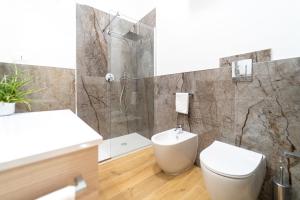 A bathroom at Ortigia Superior Sea View Apartment near Duomo