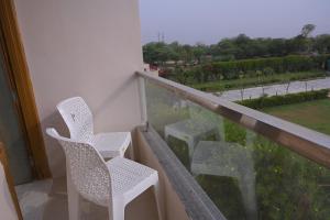Rõdu või terrass majutusasutuses The Govindam Resort