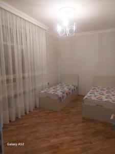 Postel nebo postele na pokoji v ubytování Luxury Guest House