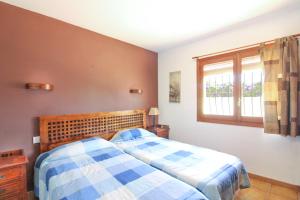 Postel nebo postele na pokoji v ubytování Villa con piscina privada - Benicolada