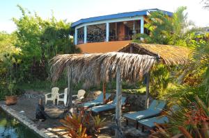 Zahrada ubytování Mango Island Lodges