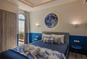 Postel nebo postele na pokoji v ubytování Asteris Village + 37 fotografií