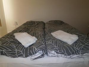 En eller flere senger på et rom på Kidagil Guesthouse