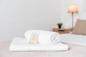 Uma cama ou camas num quarto em Casa Trindade