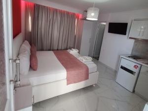 Кухня или мини-кухня в House Blerina
