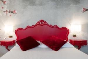 Postel nebo postele na pokoji v ubytování Villa Gasparini