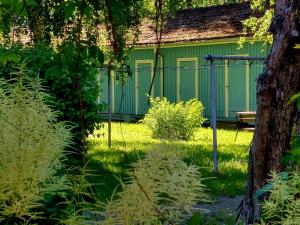 Zahrada ubytování Taideniityn huoneistot Aurinko ja Niitty 1 - 4lle