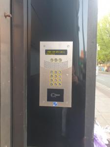 a close up of a vending machine on a street at Satori Serviced Apartments in Manchester