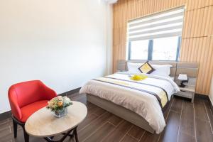 Postel nebo postele na pokoji v ubytování Anasia Hotel