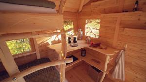 an overhead view of a wooden cabin with a desk at Pine Point in Trenčianske Teplice