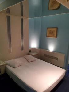 Ένα ή περισσότερα κρεβάτια σε δωμάτιο στο Argo