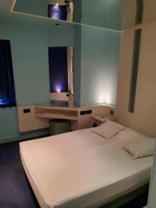 Ένα ή περισσότερα κρεβάτια σε δωμάτιο στο Argo