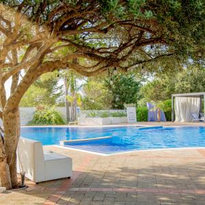 Bazén v ubytování Magaggiari Hotel Resort nebo v jeho okolí