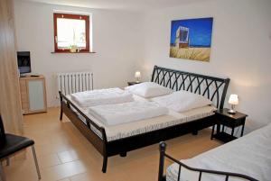 Postel nebo postele na pokoji v ubytování NEU _ Ferienwohnung am Sonnensteg