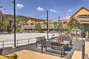 a park with benches in a town with buildings at Keystone Ski Condo with Mtn View - Walk to Gondola! in Keystone