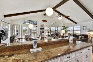a kitchen and living room with a large counter top at Prager Bay View in Galveston