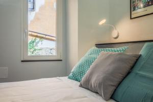 Postel nebo postele na pokoji v ubytování Stella by PortofinoHomes