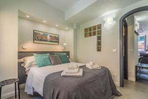 Postel nebo postele na pokoji v ubytování Stella by PortofinoHomes