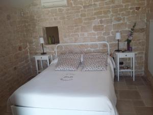 Postel nebo postele na pokoji v ubytování B&B Fiano Marchione