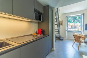 Kuchyň nebo kuchyňský kout v ubytování Stella by PortofinoHomes
