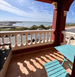 a balcony with a view of the ocean at Estudios Costavigía Mazagón by Ramona in Mazagón