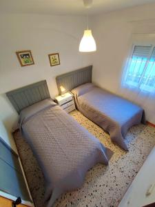 Postel nebo postele na pokoji v ubytování Casa Almadén 1 + 14 fotografií
