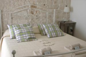 Postel nebo postele na pokoji v ubytování B&B Fiano Marchione + 7 fotografií