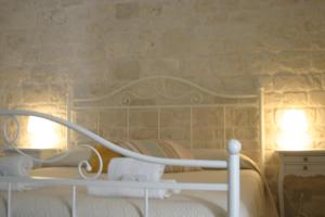 Postel nebo postele na pokoji v ubytování B&B Fiano Marchione