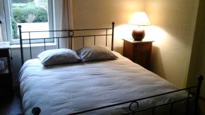 Ein Bett oder Betten in einem Zimmer der Unterkunft B&B De Hulst