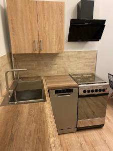 Kuchyňa alebo kuchynka v ubytovaní Apartament Second Home