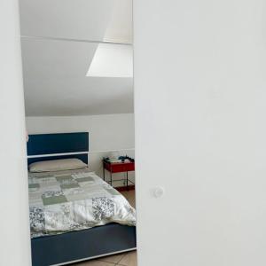 Postel nebo postele na pokoji v ubytování B&B SGUARDO AL CONERO