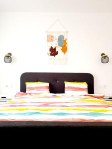 Ένα ή περισσότερα κρεβάτια σε δωμάτιο στο Eden Apartment