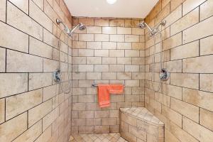 a bathroom with a shower with an orange towel at Town of Rehoboth Beach --- 51 Olive Ave in Rehoboth Beach +27 photos