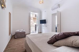 Posteľ alebo postele v izbe v ubytovaní FLOWER SUITE B&B