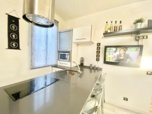 Kuchnia lub aneks kuchenny w obiekcie Piramides 1 Apartment