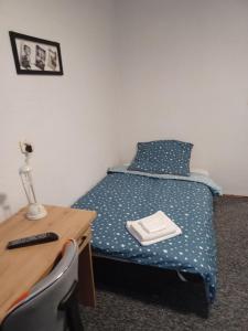Posteľ alebo postele v izbe v ubytovaní Apartament LORD