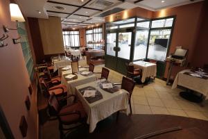 Posezení v ubytování Hôtel Au Petit Caporal