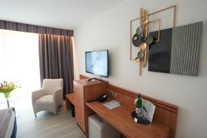 TV a/nebo společenská místnost v ubytování Parkhotel Sonnenberg