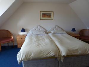 מיטה או מיטות בחדר ב-Waverley Villa