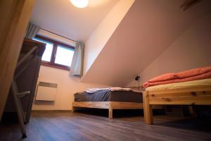 Postel nebo postele na pokoji v ubytování Apartmán Remedy